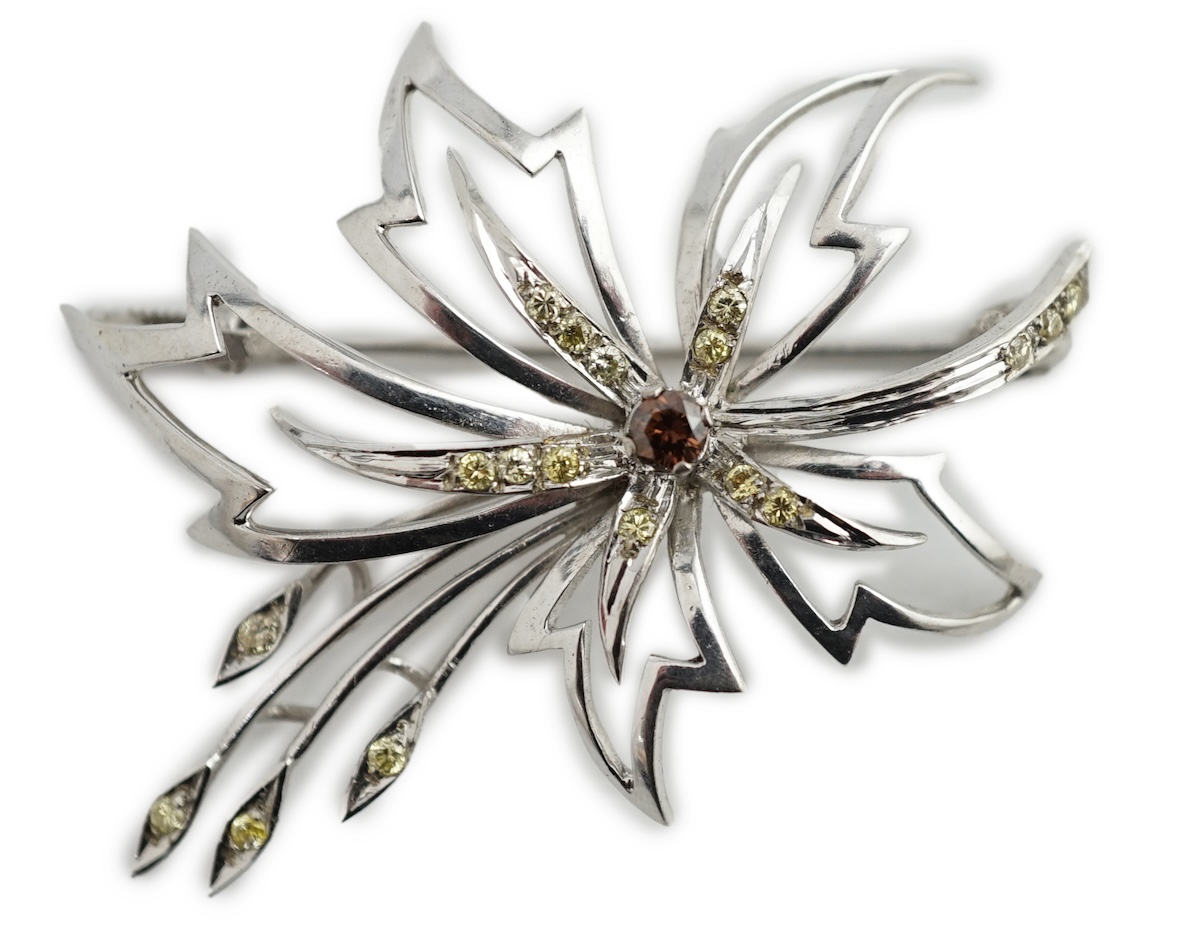 A modern 18k white gold and two colour diamond cluster set spray brooch